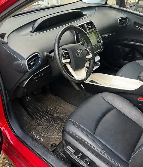 Toyota Prius dash and front floor before the detail